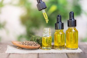 CBD oil products being transferred in small glasses. Buy CBD Oil In Durham, NC