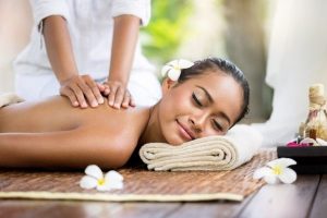 A girl treating herself with a good massage.