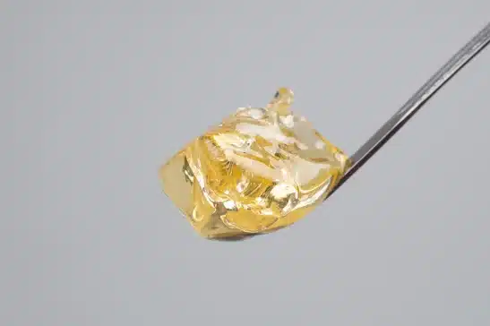 Live resin scooped by a small spoon