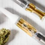Live resin carts with nugs lying on the table