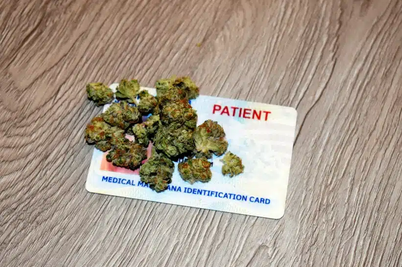Medical marijuana patient card with Delta 8 nuggs on top